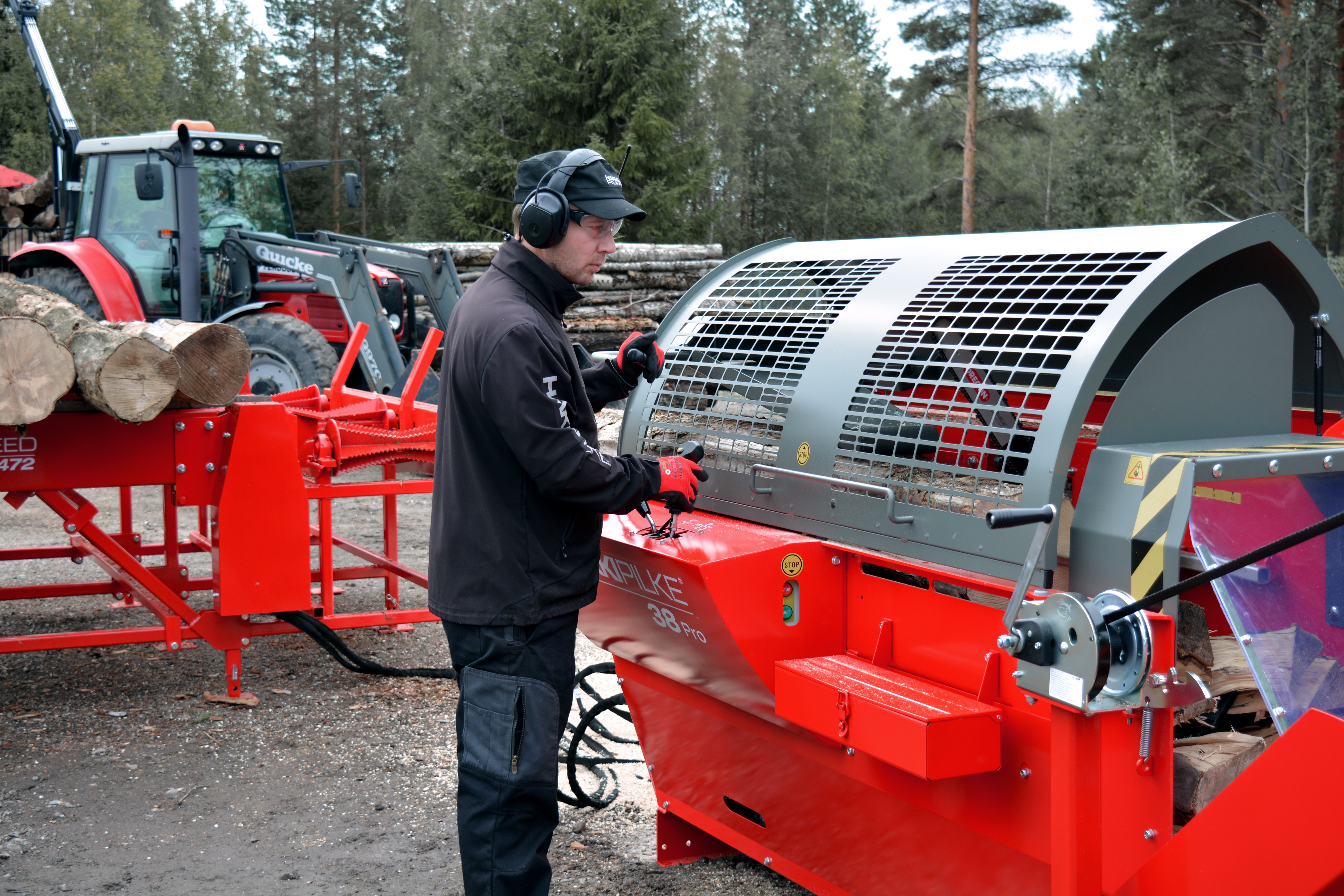A Firewood Processor with a circular saw or a chainsaw